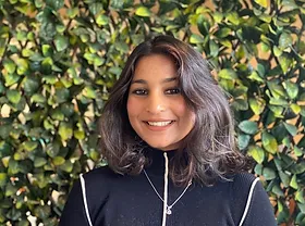 a woman smiling at camera