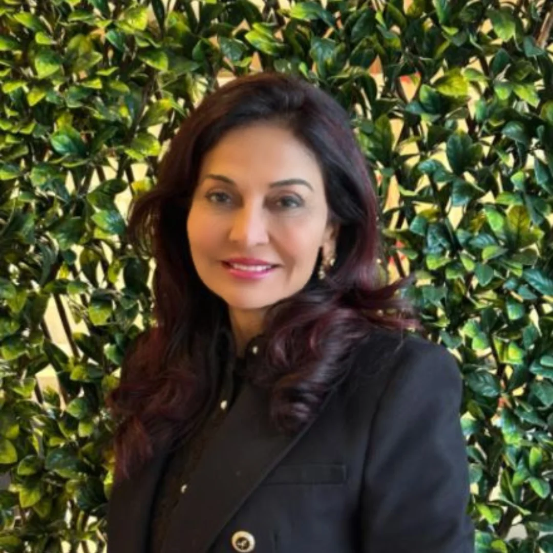 a woman in a black suit
