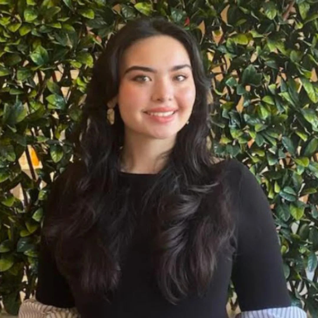 a woman smiling at camera