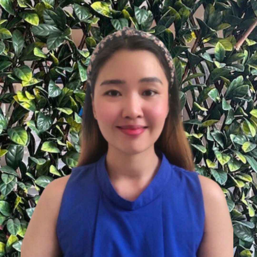 a woman in a blue shirt